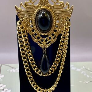Gold Tone Victorian Brooch with Black Cabochon and Chain Dangle